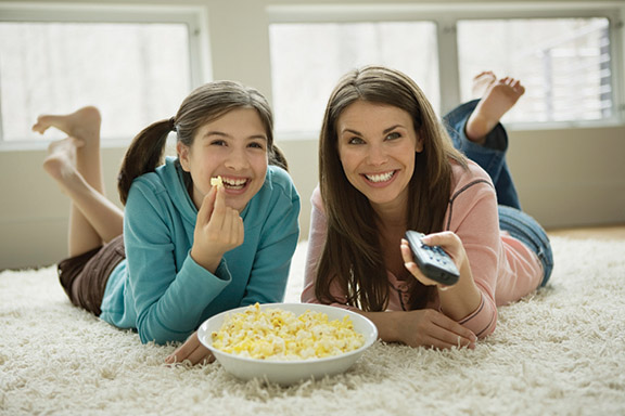 2.0b%20family%20watching%20tv%20on%20carpet_0.jpg
